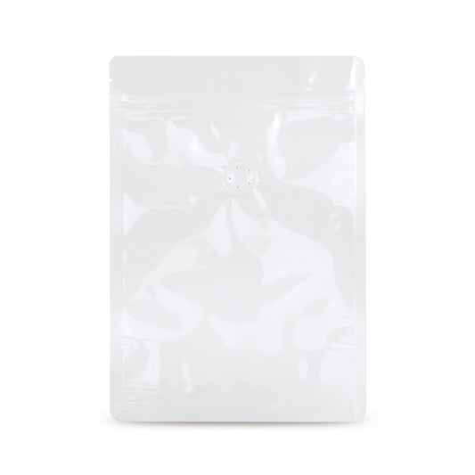 Doypack bianco con valvola per la protezione dell'aroma — Vista dettaglio in una tipica applicazione di confezionamento con esempio di contenuto
